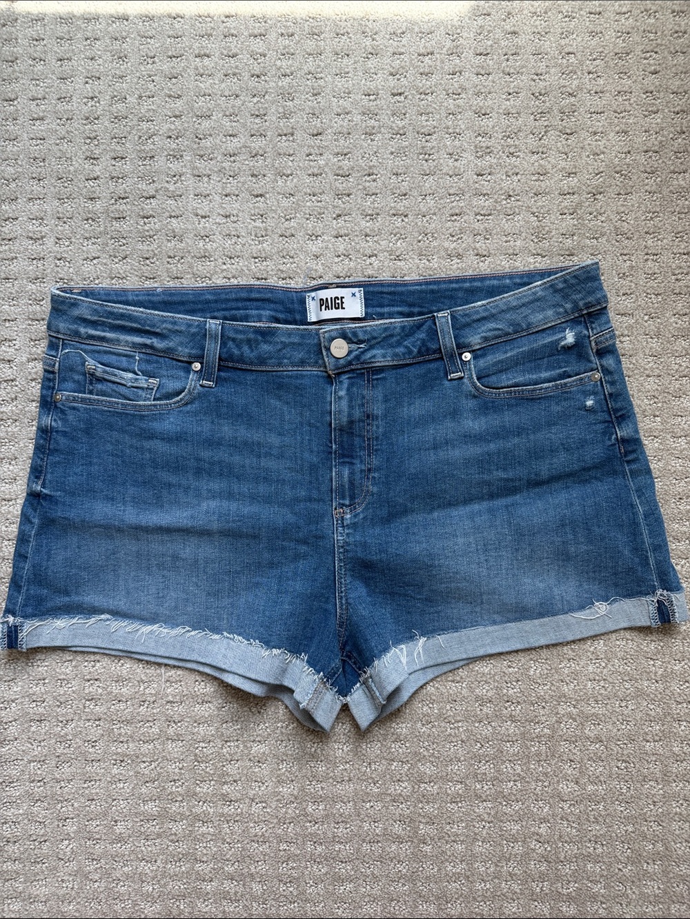 PAIGE Medium Blue Denim Cutoff Shorts with Frayed Hem